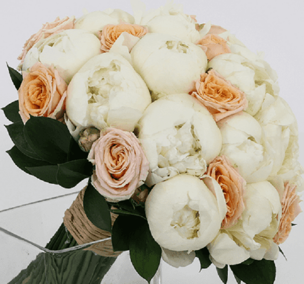 Bridal bouquet of peonies with Spray Rose