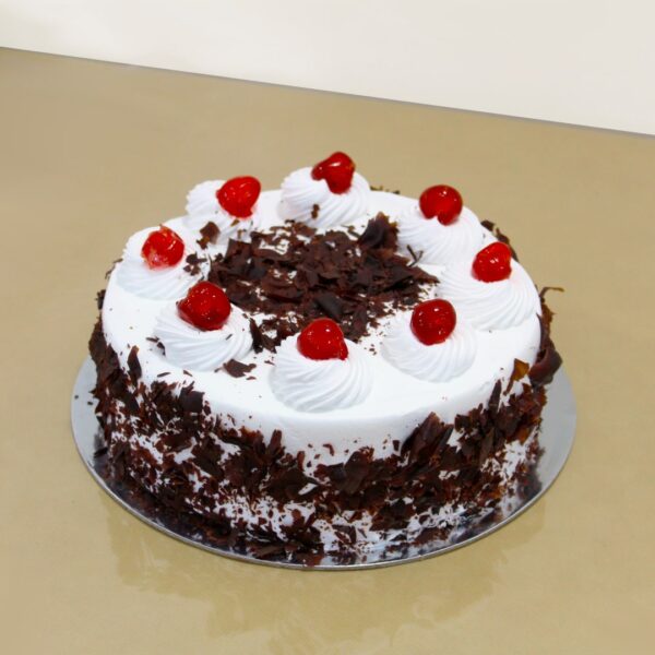 Black Forest Cake Delivery with strawberries and cherry