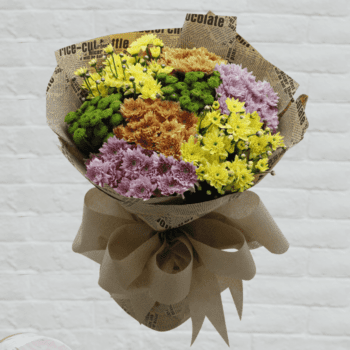 A bunch of chrysanthemums creates a beautiful and vibrant floral arrangement.
