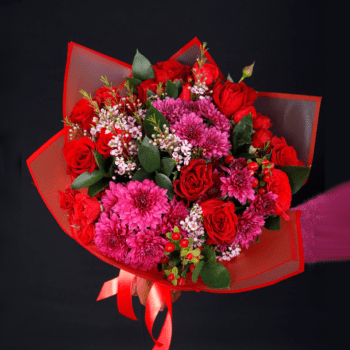 mix of Fuchsia, red roses, green flowers