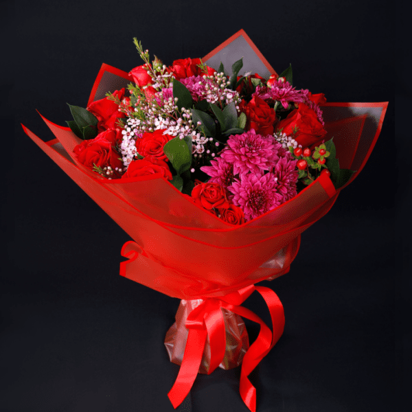 mix of Fuchsia, red roses, green flowers