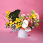 hat box full of mix flowers