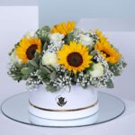 sunflowers and white roses
