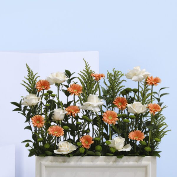 vibrant orange gerbera daisies and elegant white roses