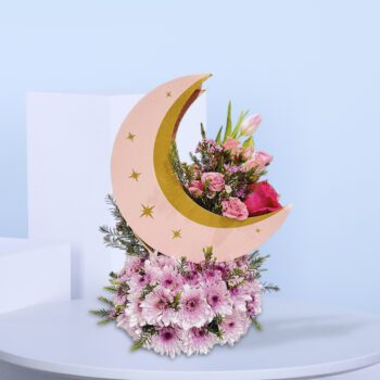 Pink flowers in a crescent moon design.