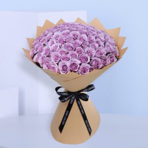 Elegance meets enchantment in our purple Rose Luxury Bouquet, a breathtaking arrangement of handpicked purple roses wrapped in eco-friendly kraft paper. Perfect for expressing admiration, celebrating milestones, or surprising someone special “just because”, these pastel purple roses stand out as a rare and meaningful gift.