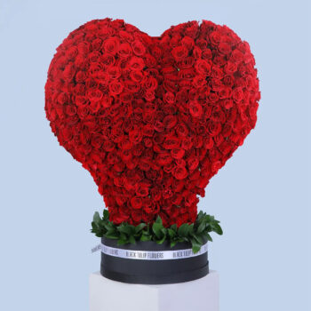 700 red roses in a heart-shaped luxury hatbox arrangement
