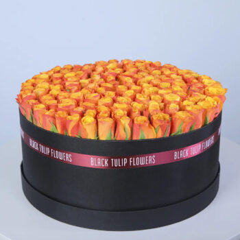 100-120 orange roses in a luxury black hatbox, finished with branded ribbon.
